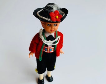 Vintage Austrian Doll with Sleep Eyes and Cultural Clothing