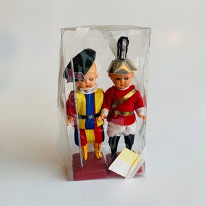 Pair of Vintage Dolls in Traditional Outfits