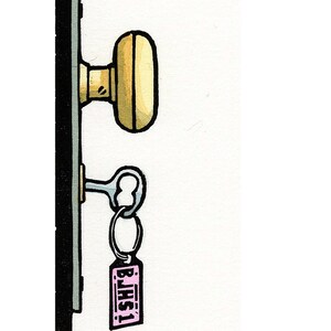 May include: A gold door knob with a key attached to it. The key has a pink tag that says "BR151".
