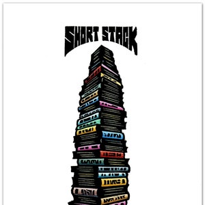 May include: A tall stack of colorful books with black spines, titled "SHORT STACK" at the top. The books are stacked on a brown platform.