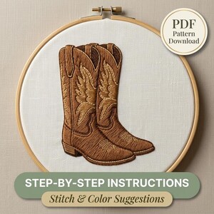 May include: An embroidery hoop containing white fabric with a brown cowboy boot design featuring intricate stitching and wing patterns. A circular badge in the top right corner reads PDF Pattern Download, and a green banner at the bottom reads STEP-BY-STEP INSTRUCTIONS Stitch & Color Suggestions.