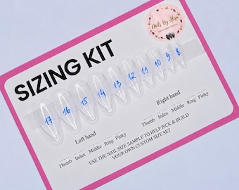 May include: A white rectangular sizing kit card with a pink border featuring ten clear press-on nail samples labeled with blue numbers 8 through 17. The card includes text for Left hand and Right hand thumb, index, middle, ring, and pinky fingers.