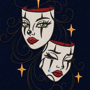 May include: An embroidery design featuring two white theatrical masks with red lips, black eye makeup, and green eyes. One mask is smiling, the other is crying with a blue tear. The masks are surrounded by black swirling lines and four gold stars.