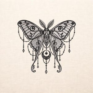 May include: A detailed black and gray illustration of a moth with intricate wing patterns and decorative beaded chains. The moth features a crescent moon and star pendant, set against a cream-colored background. The design has a vintage, gothic aesthetic.