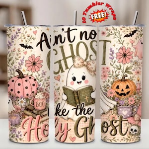 May include: Three cylindrical tumblers with straws featuring a cream background, pink pumpkins, floral patterns, and a ghost character reading a Bible. The text reads Ain't no GHOST like the Holy Ghost. Includes small bats, hearts, and a skull graphic.