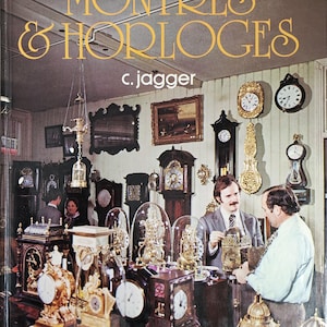 May include: Image of a book cover titled "Histoire Illustrée des Montres & Horloges" by C. Jagger. The image shows a shop filled with antique clocks, with two men examining a clock in the foreground.