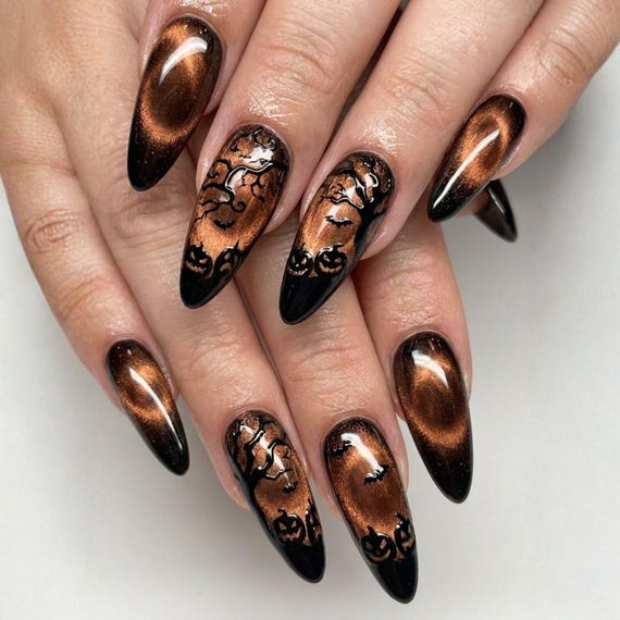 20 Halloween Nail Ideas With Ghosts, Bats and Spooky Details 15 Copper Haunted Forest