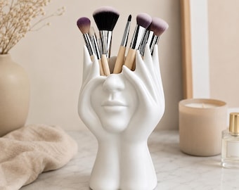 Soporte escultural para el rostro: moderno soporte para brochas de maquillaje, organizador de bolígrafos y decoración de tocador.