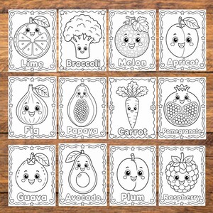 May include: Twelve black and white colouring cards depicting various fruits and vegetables, each with a smiling face. The cards include a lime, broccoli, melon, apricot, fig, papaya, carrot, pomegranate, guava, avocado, plum, and raspberry.
