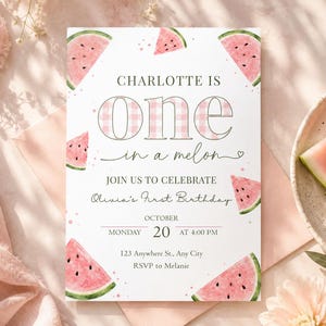 Peut inclure: Une carte d'invitation d'anniversaire rectangulaire avec un fond blanc et des tranches de pastèque à l'aquarelle dans les coins. Le texte indique : CHARLOTTE IS one IN A MELON, JOIN US TO CELEBRATE, Olivia's First Birthday, OCTOBER MONDAY 20 AT 4:00 PM.