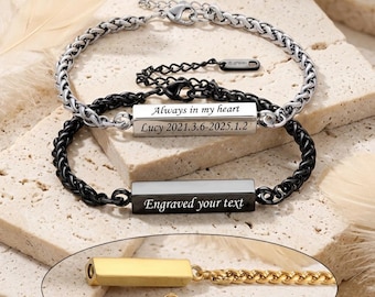 May include: Three stainless steel bracelets with a woven chain design. One bracelet is silver, one is black, and the third is gold. The black bracelet has the text "Engraved your text". The silver bracelet has the text "Always in my heart Lucy 2021.3.6-2025.1.2".