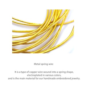 May include: A coiled length of gold-colored metal spring wire featuring a tightly wound, flexible, and ribbed texture. The wire is arranged in overlapping loops, showcasing a bright, metallic finish throughout the entire length of the material.