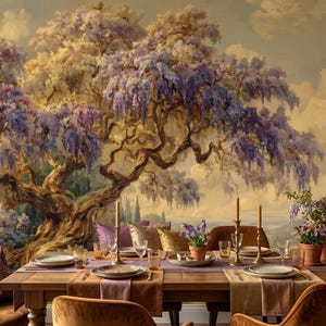 May include: A dining room scene with a large mural of a tree with purple flowers. A wooden table is set with plates, glasses, candles, and potted plants. The chairs are upholstered in a warm, golden-brown fabric.
