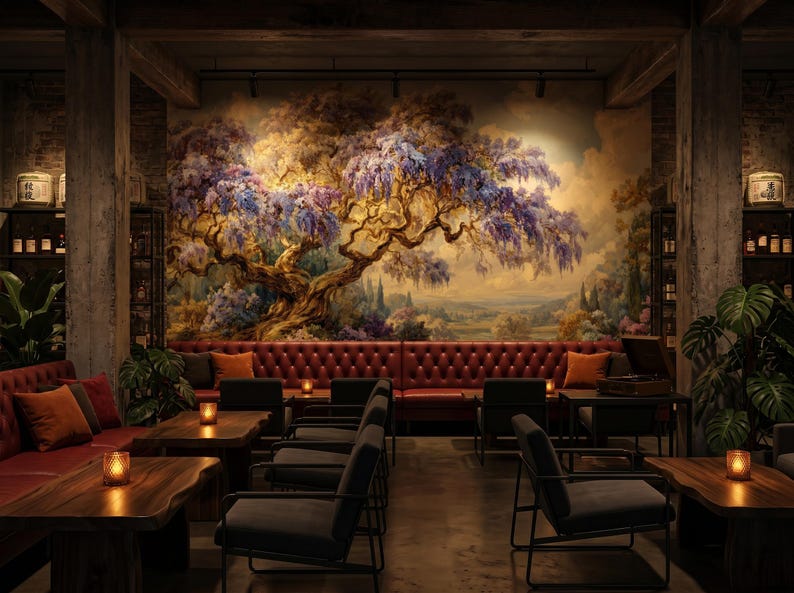 May include: An interior shot of a dimly lit lounge with a large mural of a tree in full bloom. The room features red leather seating, wooden tables, and black chairs. Candles provide soft lighting, creating a warm and inviting atmosphere.