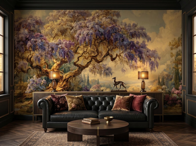 May include: A luxurious living room featuring a large, detailed mural of a tree with purple flowers. A black leather sofa with decorative pillows sits in front of a wooden cabinet. Two lamps and a bronze dog statue are on the cabinet.