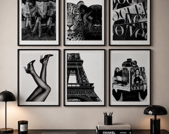May include: A gallery wall set of six black and white framed prints featuring a leopard and panther, the Eiffel Tower, legs in high heels, and fashion magazine covers with text including Vogue and Louis Vuitton, arranged in two rows of three.