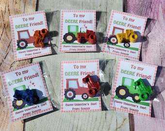 May include: Six Valentine's Day cards with the text "To my DEERE Friend!" and a small tractor-shaped crayon in each. The crayons are red, yellow, green, blue, orange, and brown.