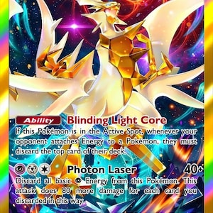 May include: A holographic Ultra Necrozma EX trading card with 300 HP. The card features a white and gold creature against a vibrant, swirling cosmic background. Text includes 'Blinding Light Core' ability and 'Photon Laser' attack details.