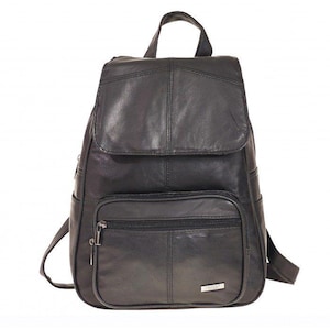 May include: A black leather backpack featuring a top handle, a main compartment with a flap closure, and a front zippered pocket. The bag includes adjustable shoulder straps and a small rectangular silver-toned metal logo plate on the front pocket.
