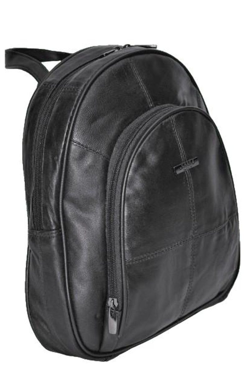 May include: A black leather backpack featuring a rounded top silhouette, multiple zippered compartments, and a small rectangular metal logo plate on the front pocket. The bag includes a top carry handle and visible stitched paneling details.