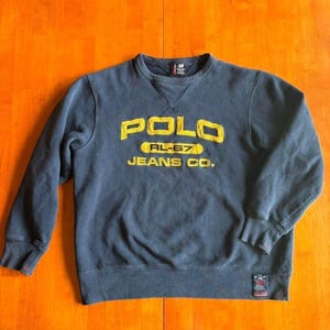 VTG Ralph Lauren Navy Fleece Crewneck with  Yellow Polo RL-67 Jeans Co. Patching