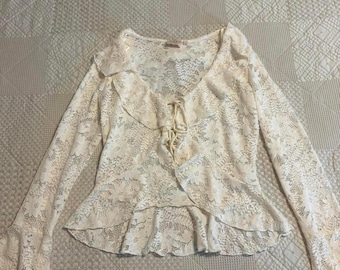Vintage creamy lace blouse with ruffles and tie detail