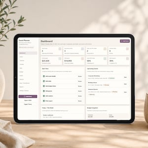 May include: A digital tablet displaying an event planner dashboard. The screen shows data including upcoming events, budget snapshots, and event details. The tablet is on a wooden surface, with a vase and a cup in the background.