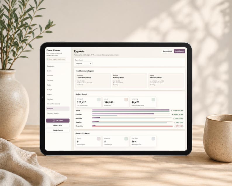 May include: A black tablet displaying an event planner app interface with financial reports. The screen shows data visualizations, budget summaries, and event details. A vase with greenery and a ceramic cup are in the background.