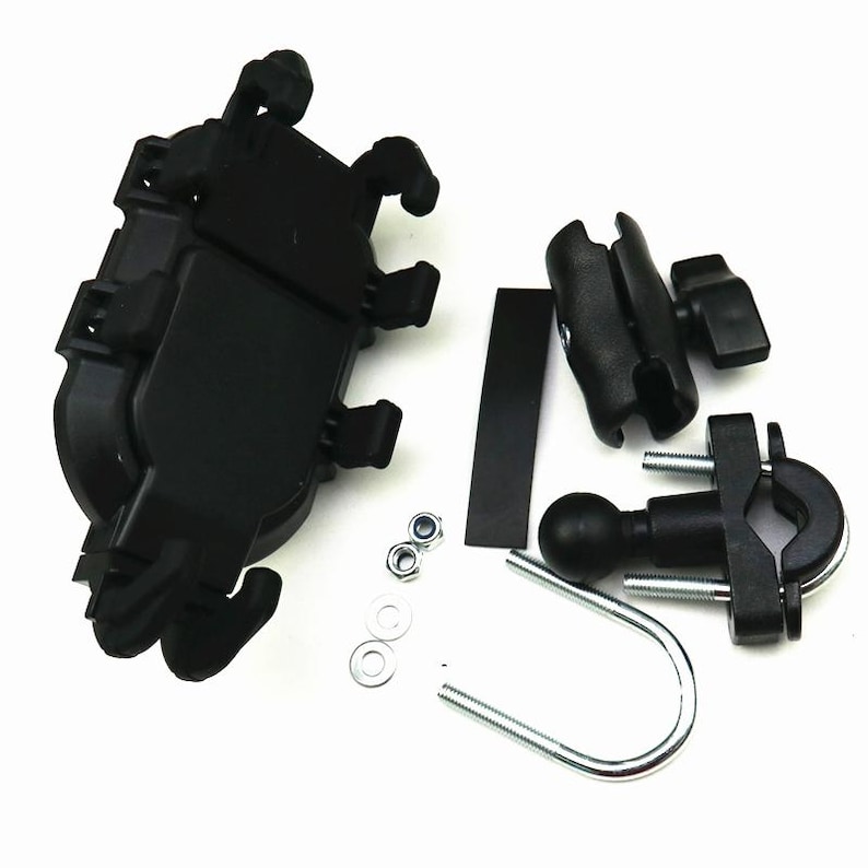May include: A black motorcycle phone mount kit, featuring a clamp-style holder, ball joint, and various mounting hardware. The kit includes a U-bolt, nuts, and washers for secure attachment. The components are made of black plastic and metal.