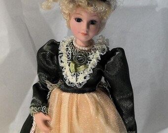 Vintage Victorian Porcelain Doll Green and Cream with Stand