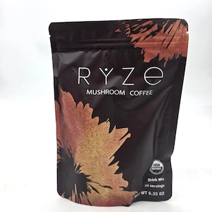 May include: A black and brown pouch of RYZE Mushroom Coffee. The pouch features the brand name in white, with the words "Mushroom Coffee" below. The bottom right corner has the text "USDA Organic", "Drink Mix", "30 servings", and "WT 6.35 OZ".