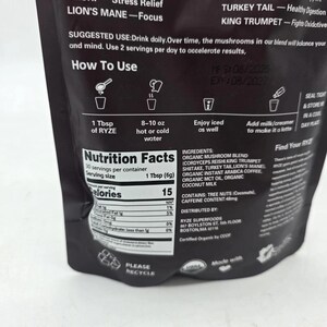 May include: A black bag of RYZE mushroom blend with text including "Nutrition Facts" and "How To Use" instructions. The bag lists ingredients, including organic mushroom blend, and suggests mixing with water. The bag also includes the expiration date.