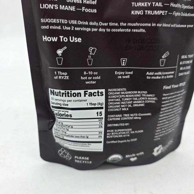 May include: A black bag of RYZE mushroom blend with text including "Nutrition Facts" and "How To Use" instructions. The bag lists ingredients, including organic mushroom blend, and suggests mixing with water. The bag also includes the expiration date.