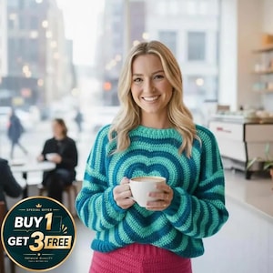 May include: A woman wearing a teal and blue striped crochet sweater with a heart design, holding a white coffee cup. She is also wearing a pink skirt. The image includes a "Buy 1 Get 3 Free" promotion.