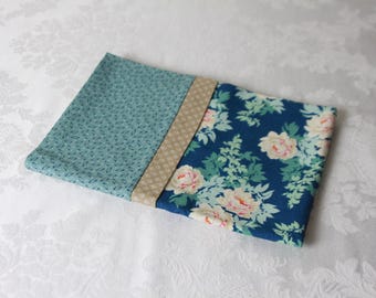 Travel sized pillowcase 14.5" x 21.5" floral pattern on teal background