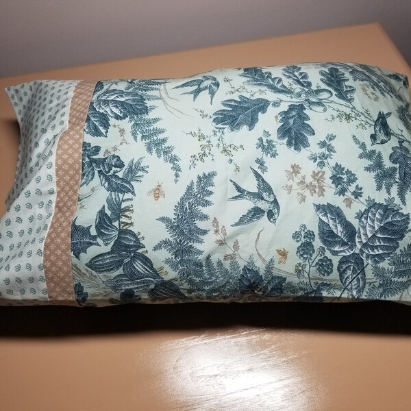 Travel sized pillowcase 14" x 21.5" floral pattern on mint green background