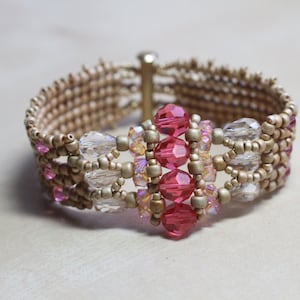 Beaded bracelet - matte gold, pink, and peach tones