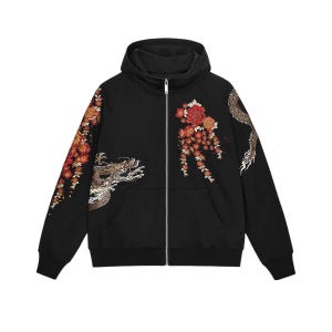 May include: A black zip-up hoodie featuring intricate embroidery of a dragon and red floral patterns on the sleeves and front. The garment includes a hood, a silver-toned front zipper, ribbed cuffs, and a hem, showcasing detailed needlework.