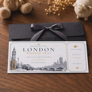 May include: A boarding pass gift voucher for a London weekend away, featuring illustrations of Big Ben, a red telephone box, a black taxi, and the Houses of Parliament. The text reads London Weekend Away, A West End City Break for Amelia, 18-20 October 2027, With Love, Sophie X, and Gift Voucher.