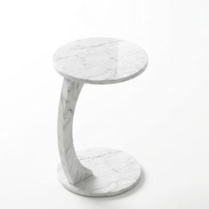 May include: A white marble side table with a circular top and base, connected by a curved support. The table has a modern design and measures approximately 20 inches in diameter and 24 inches high.
