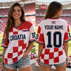 May include: A white and red checkered sports jersey featuring the text CROATIA on the front and the text YOUR NAME with the number 10 on the back. The jersey includes a small Croatian flag emblem on the chest and upper back area.