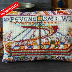May include: A rectangular cushion with a cross-stitch design of a boat scene, featuring figures and the text "AD PEVENE..." at the top. The design incorporates red, blue, yellow, and green threads. A red banner with "PDF DOWNLOAD" is in the upper left corner.