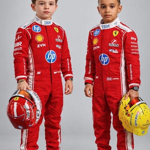 May include: Two red racing suits featuring white side stripes and various sponsor logos including HP, IBM, Shell, and Zyn. One suit displays the number 16, the other 44. Each suit is paired with matching red racing shoes and a racing helmet.