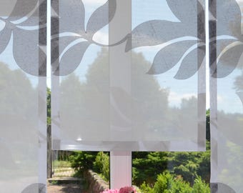 May include: Sheer white window panels featuring a repeating dark gray leaf pattern. The curtains are translucent, allowing light to pass through, and are positioned in front of a window with a potted plant containing pink hydrangea flowers.