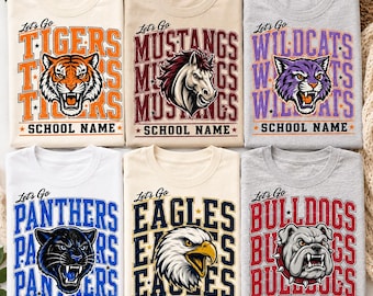 May include: Six short-sleeve t-shirts featuring animal mascots and the text Let's Go and SCHOOL NAME. The shirts display a tiger, mustang, wildcat, panther, eagle, and bulldog with corresponding team colors in orange, maroon, purple, blue, navy, and red.