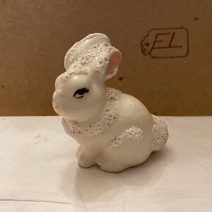 Mid century white rabbit with pink eyes