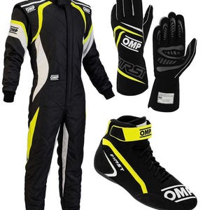 May include: A black racing suit with yellow and white accents, featuring the OMP logo on the chest and shoulders. Included are a pair of black racing gloves with white OMP branding and a black racing shoe with yellow trim and the OMP logo.