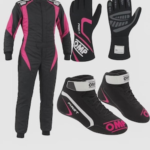 May include: A black and pink racing suit, a pair of black and pink racing gloves with OMP branding, and a pair of black and pink racing shoes with white straps and OMP logos. The suit features long sleeves and a high collar, while the gloves and shoes display the text FIRST and OMP.