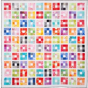 May include: A colorful quilt with a patchwork design featuring squares of various fabrics and patterns. The quilt is made up of a grid of squares, each with a different fabric and pattern. The quilt is a vibrant and cheerful piece of art.