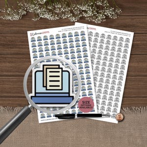 May include: Two sheets of planner stickers featuring a laptop icon with a document overlay. One sheet displays blue and beige icons, the other black and white. A magnifying glass, a black pen, and a copper penny are placed on top of the sticker sheets.